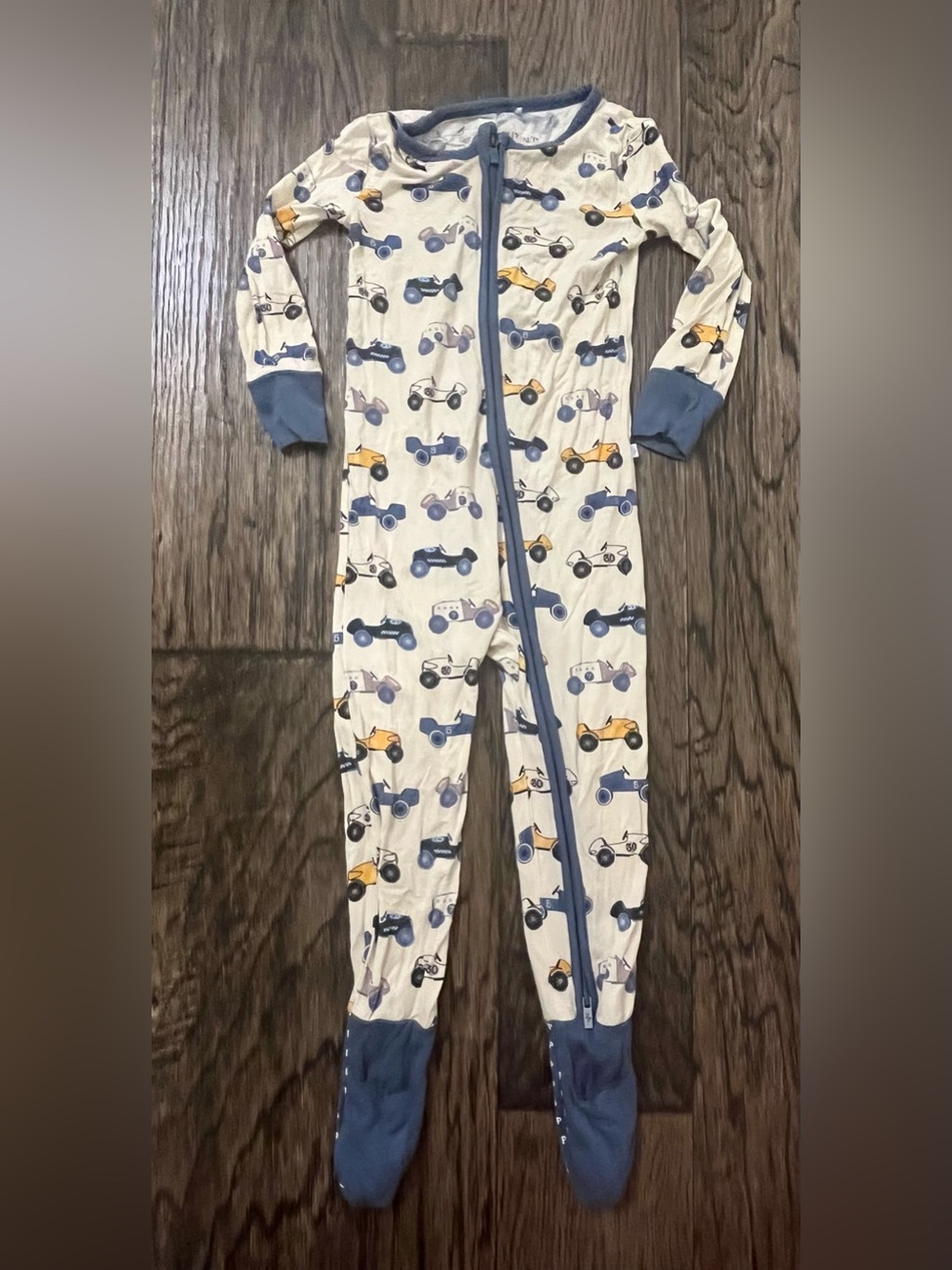 Posh Peanut Cream Racing Cars Footed One-Piece with Blue Trim
